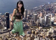 collage city mega black_hair clothed walking sunglasses flip_flops bag jennifer_love_hewitt green_skirt