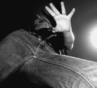 monochrome clothed finger jeans low_angle hand reaching looking_down grabbing rings point_of_view