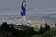 giantess high_heels dress town walking docop emma_stone looking_into_distance