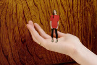 collage clothed handheld finger brunette hand shrunken_woman rings