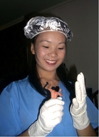 handheld gloves asian shrunken_men nurse hand examine