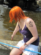 collage nami one_piece cleavage water red_hair shrunken_woman entrapment sunny tattoo