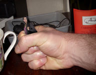 black_hair male handheld asian shrunken_woman captured