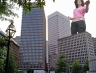 giantess collage city black_hair jeans low_angle top holding_vehicle