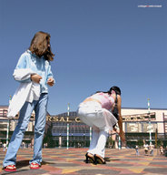 collage city black_hair clothed high_heels jeans brunette sandals bending_over people giantesses sky sunny micronaut