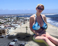 giantess collage blonde swimsuit beach cleavage ocean cars huge_breasts sitting sunglasses sky sunny looking_at_viewer