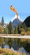 giantess blonde sitting mountains river trees looking_at_viewer rocks wilderness