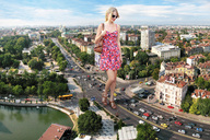 giantess collage city blonde traffic smiling sunglasses clouds sky bag docop taylor_swift summer_dress