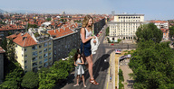 giantess collage city blonde black_hair clothed multiple_sizes shadow giantesses sunny docop taylor_swift selena_gomez
