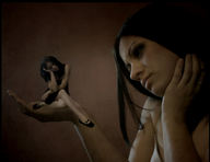 collage handheld brunette lesbians shrunken_woman little_black_dress looking_at_tiny