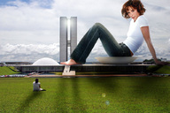 giantess clothed barefoot buildings brunette unknown_artist sitting grass clouds sky looking_at_viewer jennifer_love_hewitt