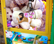 collage black_hair shrunken_woman claw rubber_apex looking_at_viewer megan_fox teddy_bears claw_machine soft_toys