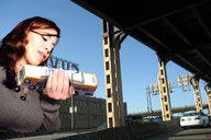 giantess long_hair destruction handheld traffic brunette lips bus giantess_katelyn highway vehicles looking_at_tiny