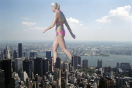 collage city mega blonde swimsuit ponytail walking skyscrapers clouds sky