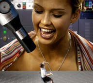 collage brunette smiling shrunken_men face shrink_gun looking_at_tiny
