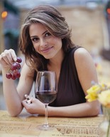 collage handheld brunette smiling shrunken_men captured looking_at_viewer grapes glass_of_wine