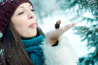 giantess handheld shrunken_woman snow winter blowing_on