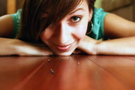 collage face shrunken_people looking_at_viewer running_away hardwood_floor