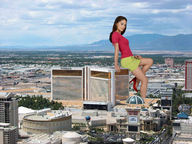 giantess collage brunette unknown_artist las_vegas looking_at_viewer kristin_kreuk caesars_palace sitting_on_casino the_mirage
