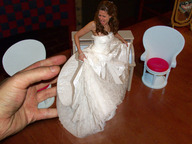 collage brunette scared hand wedding_dress reaching shrunken_woman grabbing