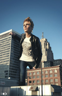 giantess collage city blonde clothed jeans short_hair sky sunny jacket