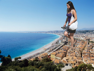 giantess collage city beach ocean buildings brunette walking flip_flops handbag