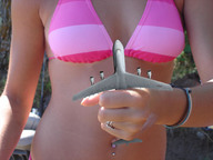 collage swimsuit handheld hand captured sunny holding_airplane shrunken_airplane