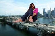 giantess collage city bridge clothed barefoot unknown_artist sitting vehicles blocking_highway