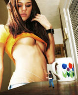 collage brunette scared shrunken_men belly looking_down on_table coffee_cup looking_at_tiny