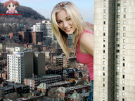 giantess collage city blonde buildings smiling looking_at_viewer kaley_cuoco rooftop_view behind_skyscraper