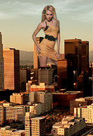 giantess collage city blonde buildings unknown_artist jessica_alba looking_at_viewer sunset_lighting