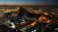 giantess collage city clothed lying_down unknown_artist night lights