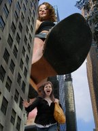 giantess collage city shoes running shrunken_woman looking_down point_of_view raised_foot between_buildings upward_view imminent_crush looking_at_tiny