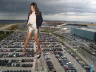 giantess collage clothed high_heels buildings brunette wonderslug celebrity looking_down parking_lot crushed_car mila_kunis