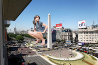 giantess collage city clothed high_heels buildings brunette wonderslug squatting vehicles crouching looking_back obelisk monument