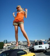 giantess collage blonde clothed barefoot low_angle unknown_artist highway vehicles point_of_view looking_at_viewer