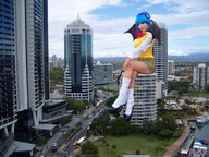 giantess collage city blue_hair shoes socks asian sitting cosplay skyscrapers looking_at_viewer rosario+vampire kurono_kurumu