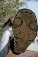 low_angle sneakers photograph foot_pov point_of_view imminent_crush