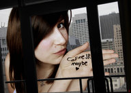 giantess city long_hair mouth brunette kissing hand funny jr nose point_of_view necklace looking_at_viewer