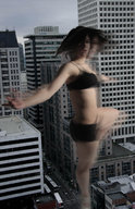 giantess panties city black_hair bra buildings underwear short_hair town jr streets dancing cracked_pavement spinning