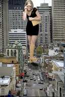 giantess collage city blonde clothed buildings glasses wonderslug boots walking streets vehicles looking_at_viewer melissa_joan_hart