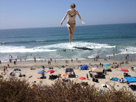 giantess blonde swimsuit beach ocean wonderslug running sunglasses taylor_swift