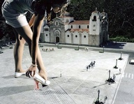 giantess crush collage city long_hair small_men blood brunette gore shorts bending_over walking looking_down outdoors church