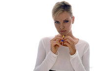 collage blonde clothed handheld shrunken_men face reaching between_fingers looking_at_viewer charlize_theron accasbel