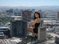 giantess collage feet city black_hair clothed high_heels buildings squatting kneeling crouching tolik construction looking_at_viewer downward_angle