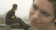 giantess collage brunette smiling close_up big_face rooftop man_sitting sandra_speichert looking_at_tiny
