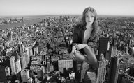 collage city monochrome buildings brunette sitting skyscrapers keira_knightley looking_at_viewer docop downward_view