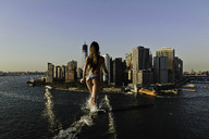 giantess collage city mega butt swimsuit water brunette wonderslug skyscraper new_york_city wading behind_view