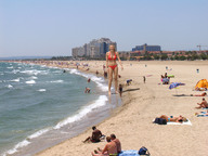 giantess collage blonde swimsuit beach cleavage smiling wonderslug mini_giantess waves sand nell_mcandrew beach_goers restort_area