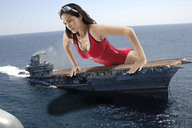 breasts giantess collage mega swimsuit ocean brunette wonderslug ships aircraft_carrier sinking pushing_down tal_berkovich